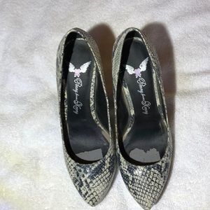 Sky high snake skin print heels